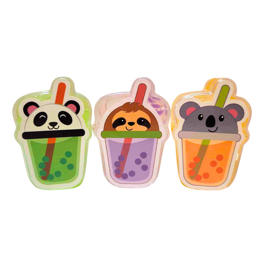 All three Boba Tea Inspired Slimes. From left to right, there is a panda themed green slime with green beads, a sloth themed clear slime with purple beads, and a koala themed orange slime with orange beads.