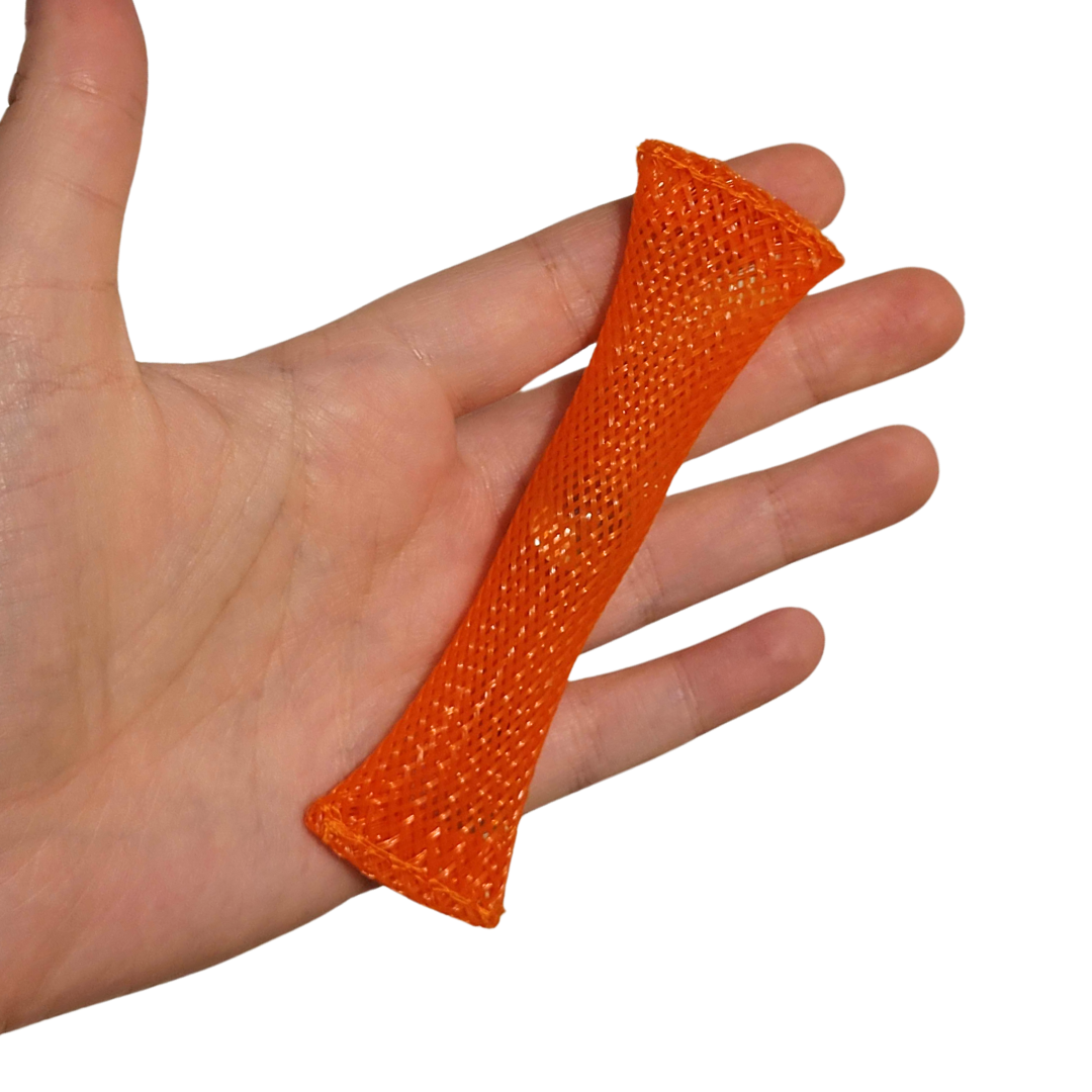A person's hand holds out an orange marble fidget.