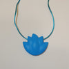 Blue Lotus Chewable Necklace on blue colored satin cord