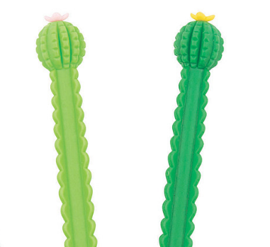 Close up of the top of two textured cactus pens. On the left is a light green pen with pink flower. On the right is a dark green cactus pen with yellow flower.