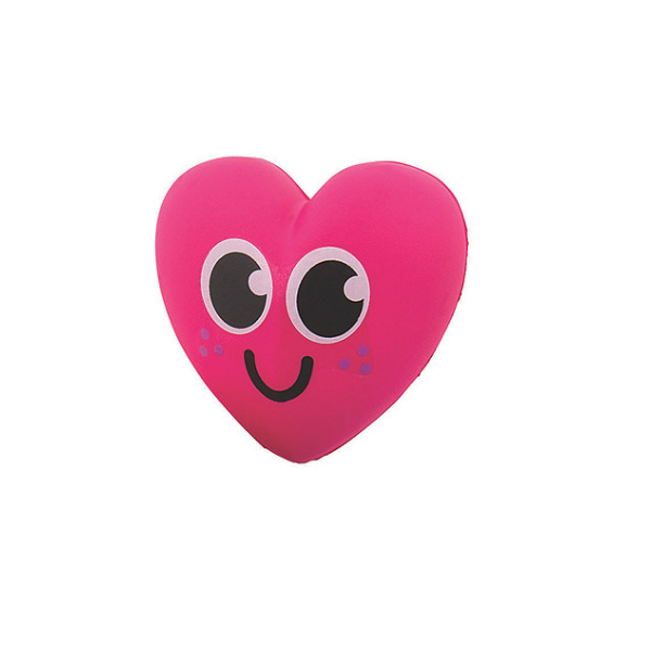 A pink happy heart slow rise squishy. It has a closed smiling mouth and purple freckles.