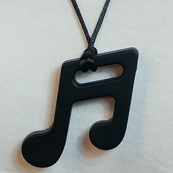 Black Music Note Chewable Necklace up close