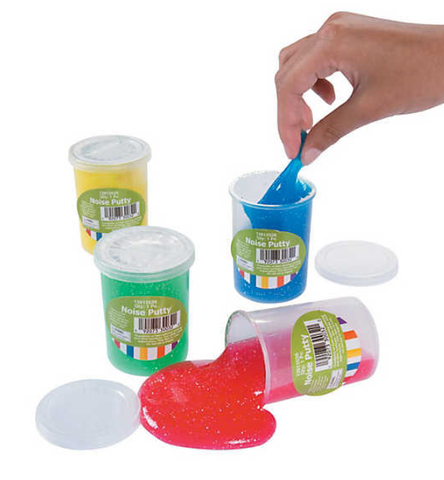 Four containers of Glitter Noise Putty, in yellow, green, red, and blue. The red and blue containers are open. The red putty pours out onto the table, and the blue putty is being pulled out of the container by a hand.