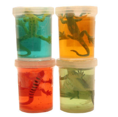 Lizard Slime Jars. From top to bottom, left to right: blue with yellow lizard, orange with teal lizard, red with red lizard, and green with green lizard.