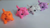 Water-Bead Filled Unicorn Squishies. From left to right - orange, pink, white, and purple.