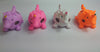 Water-Bead Filled Unicorn Squishies. From left to right - purple, pink, white, orange.